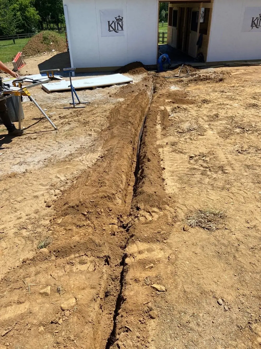 Drainage trench dug to a stable building to carry water away from the foundation in West Chester, PA